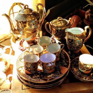 Moriage demitasse set with plates and gold leaf.